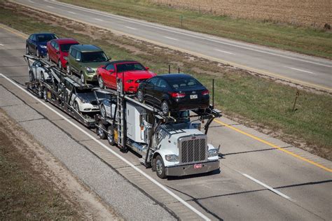how are cars shipped from factory to dealership